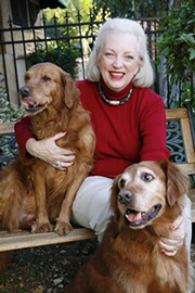 Judy with golden retrievers Agatha and Daphne